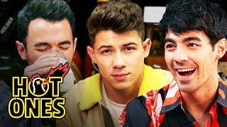 The Jonas Brothers Burn Up While Eating Spicy Wings  Hot Ones [upl. by Adaval]