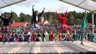 Competitors in the Hullachan Scottish Highland Dance during the 2019 Braemar Gathering in Scotland [upl. by Anaynek58]